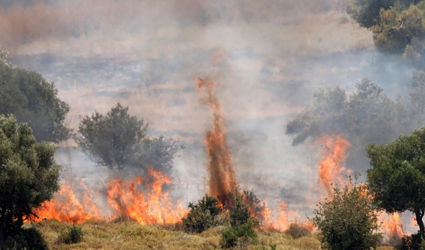 Hezbollah rains rockets on Israel after strike kills commander