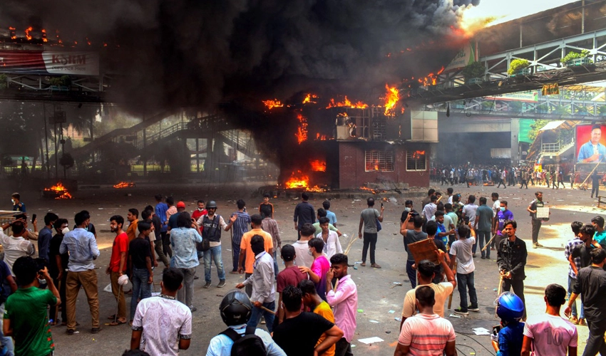 Bangladesh capital bans rallies after government buildings torched